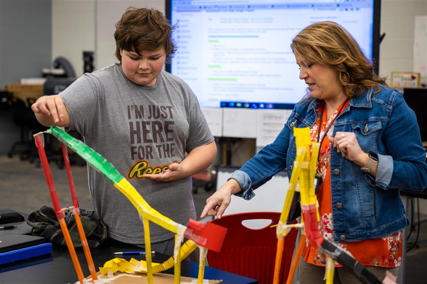 Students build paper rollercoasters